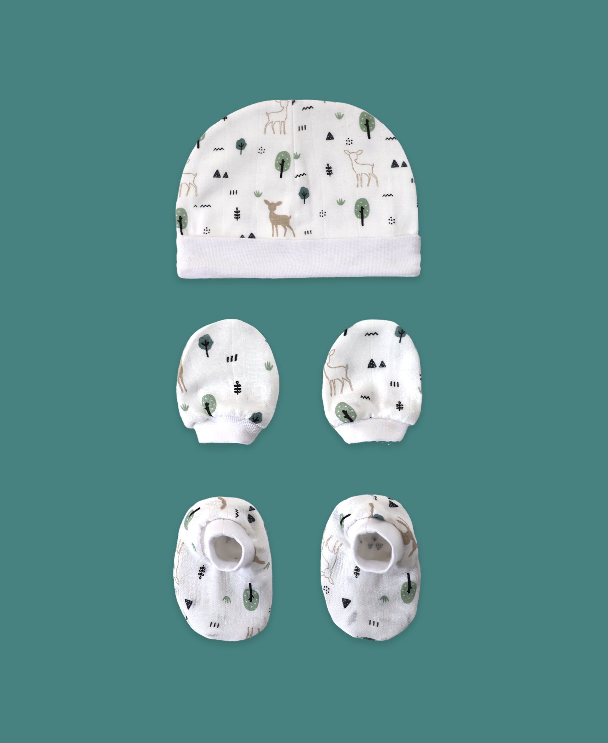 Organic muslin Deer and Trees print newborn cap mittens booties set by Maa Toddlers India