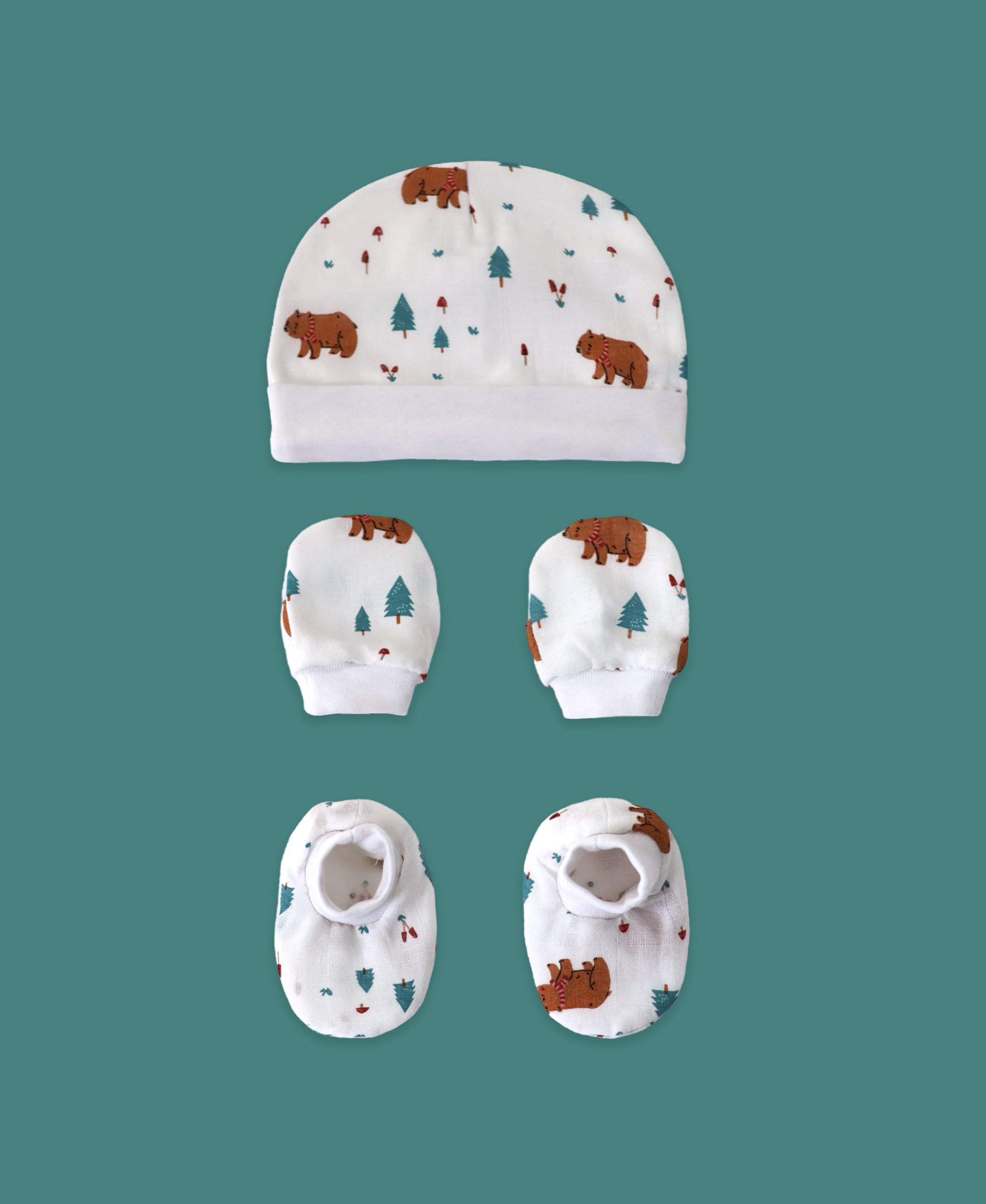 Organic muslin cap mittens and booties set for newborn baby in Snow Bear print by Maa Toddlers