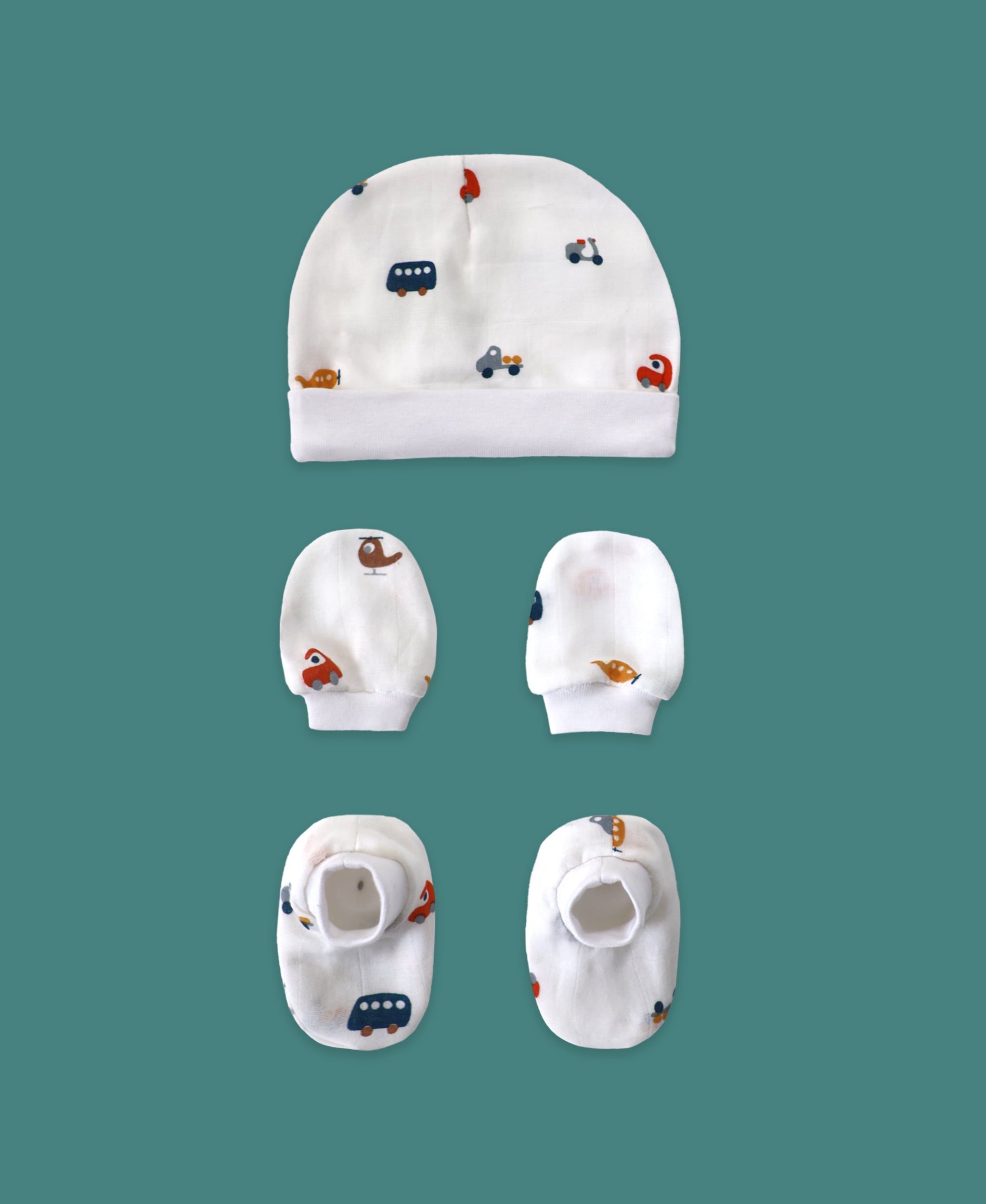 Tiny Rides print organic muslin newborn cap mittens booties set by Maa Toddlers India